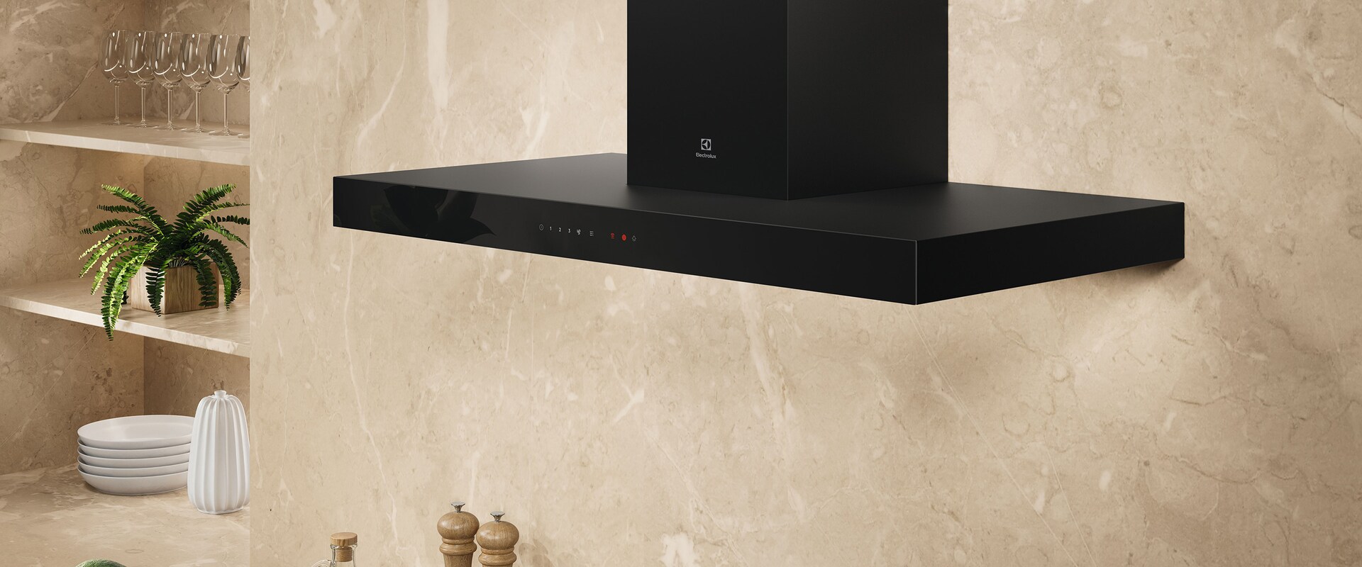 A black cooker hood placed on a beige wall in a kitchen.